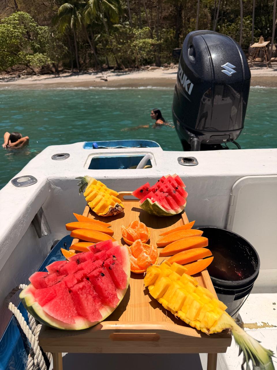 Tropical fruit and sashimi platter on the boat